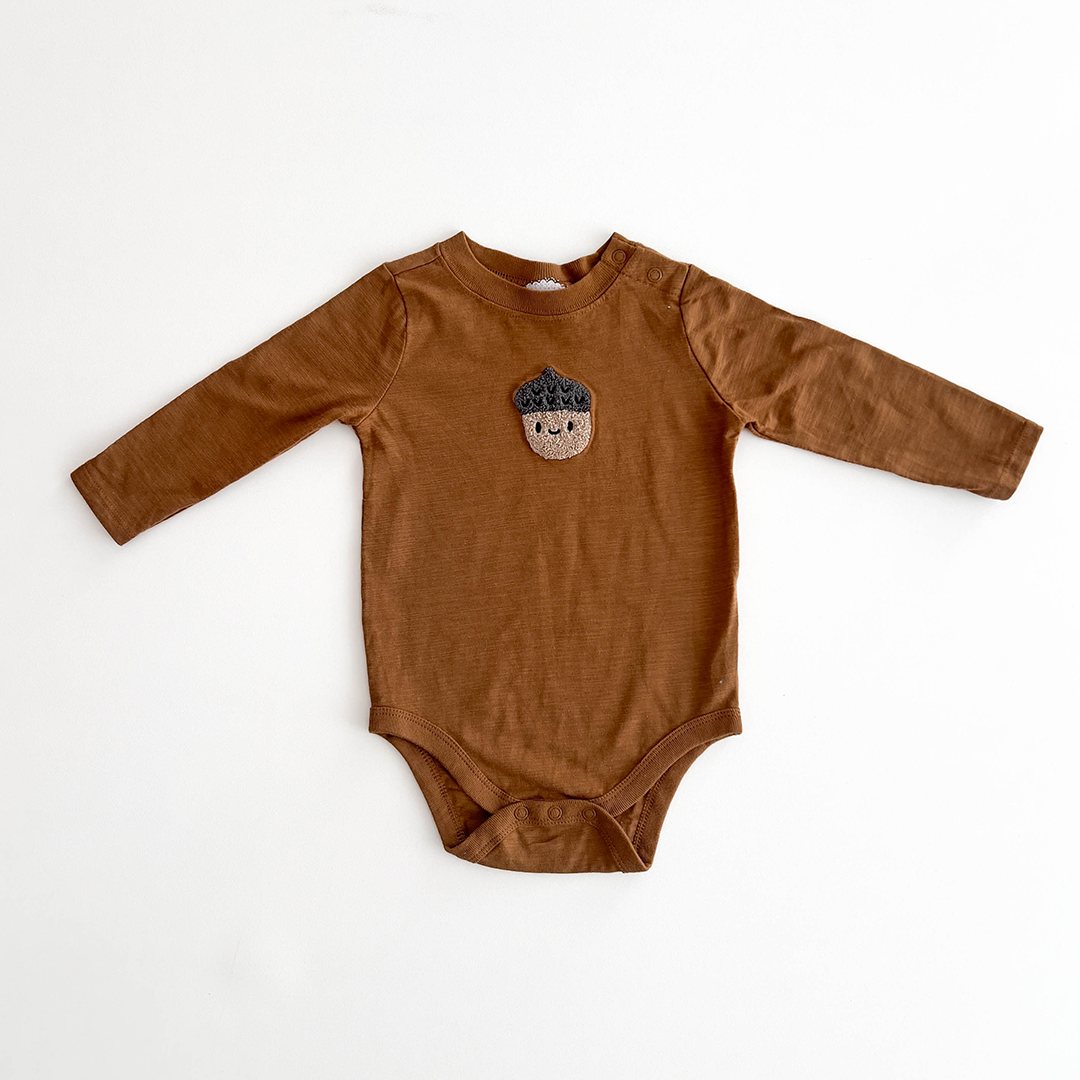 BROWN PATTERNED ONESIE