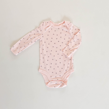 PEACH LOVE PATTERNED ONESIE