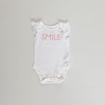 WHITE SMILE PRINT ONESIE
