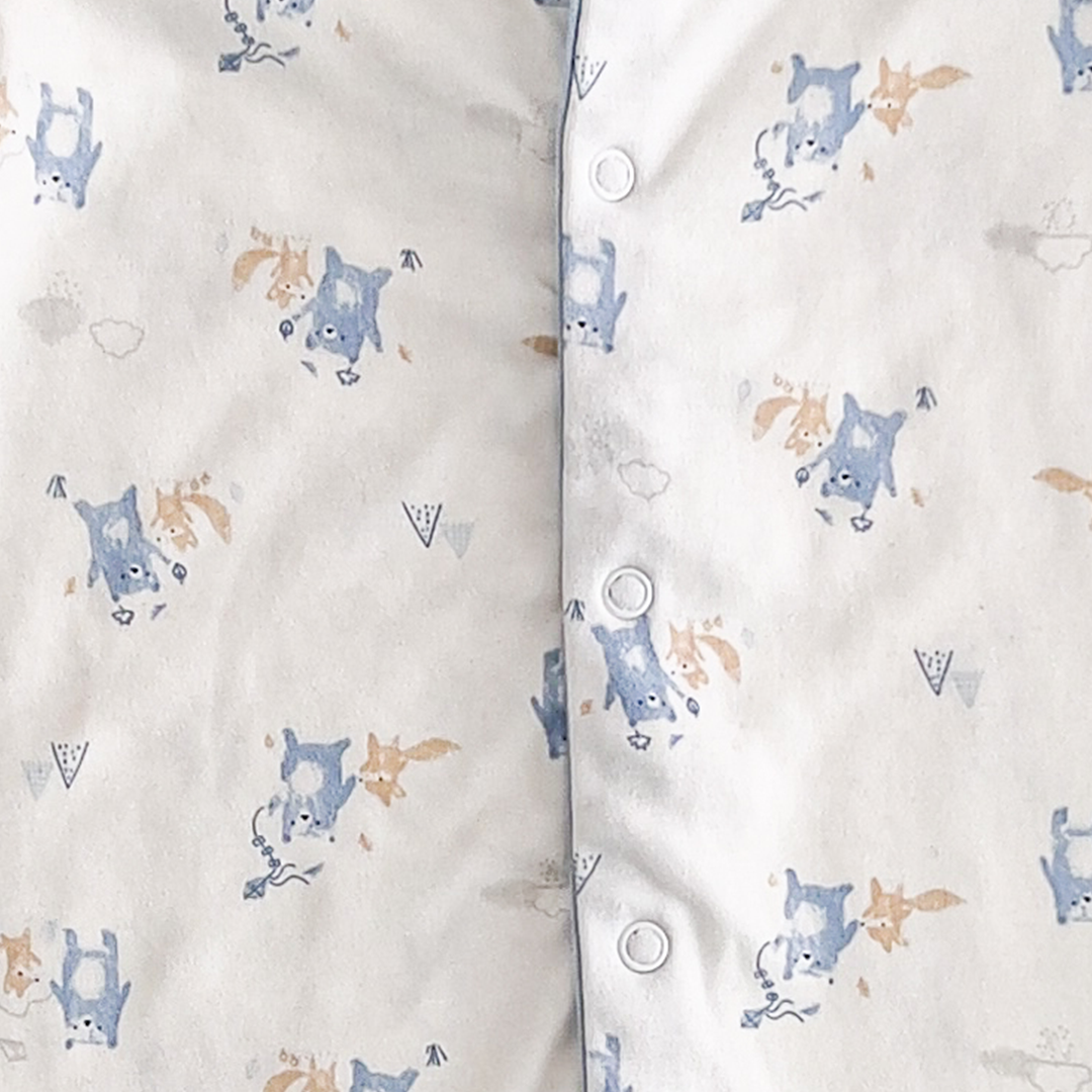 BLUE AND WHITE ANIMAL PRINT SLEEPSUIT