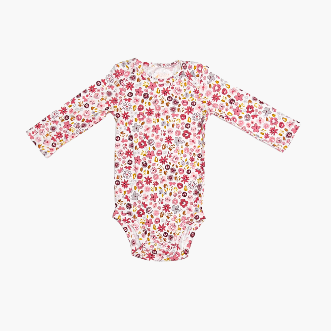 PINK FLORAL PATTERNED ONESIE