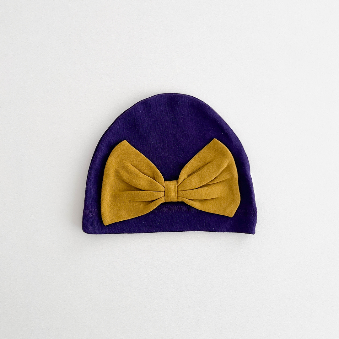 YELLOW BOW PURPLE CAP