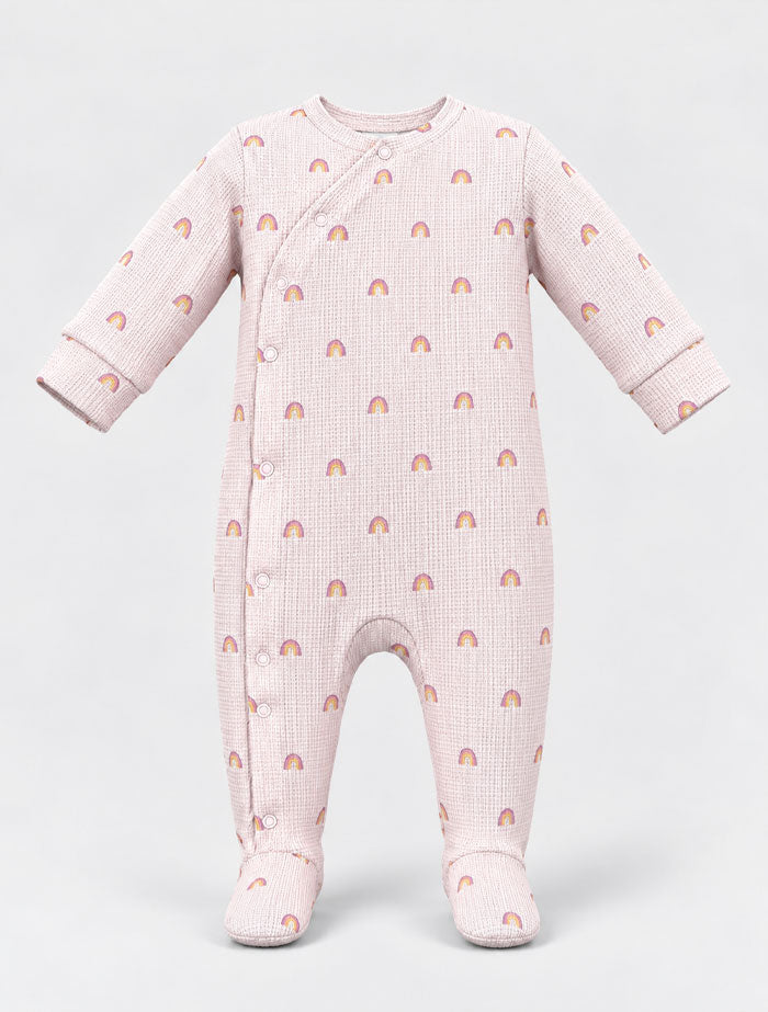 Dusty pink knitted rainbow sleep suit
