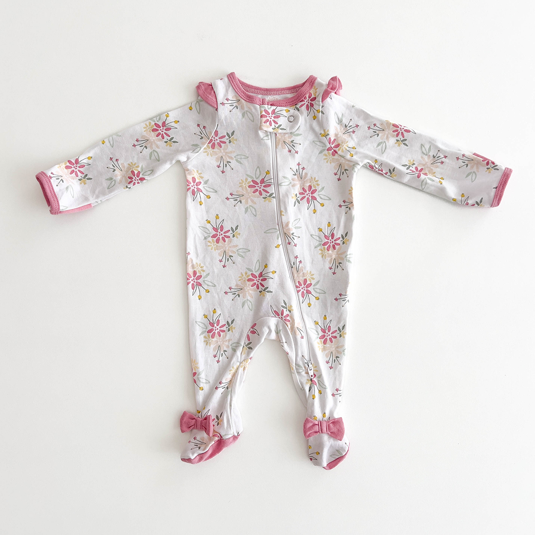 PINK FLORAL RUFFLED SLEEPSUIT