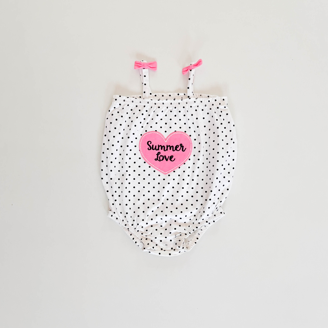 BLACK POLKA DOTTED ONESIE