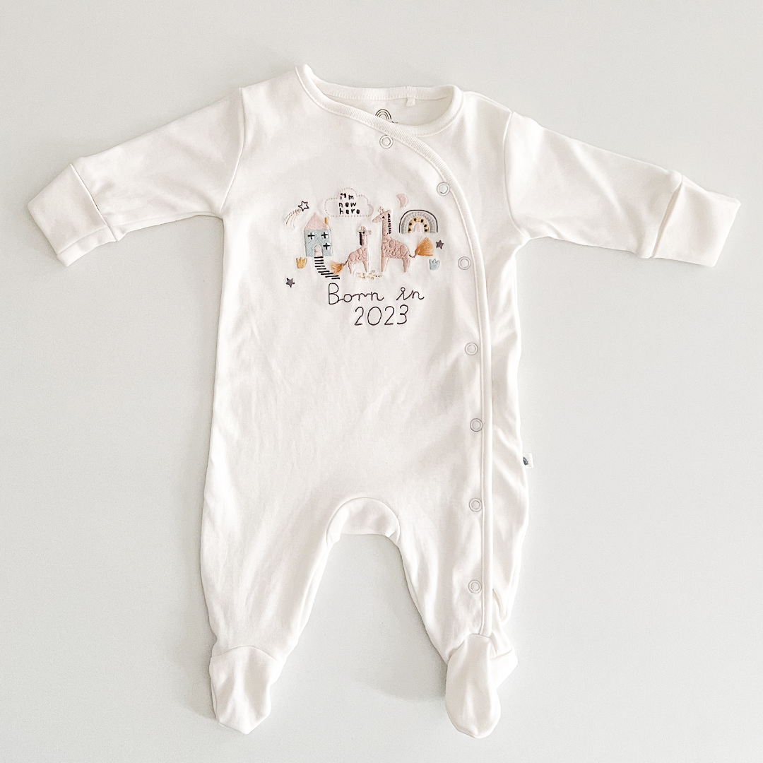 White born in 2023 sleepsuit
