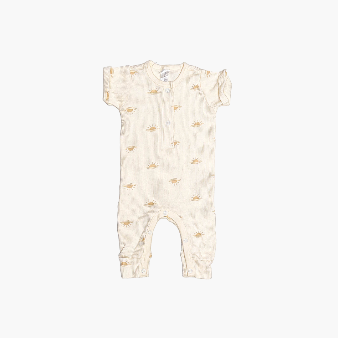 SUN PATTERNED KNITTED ROMPER