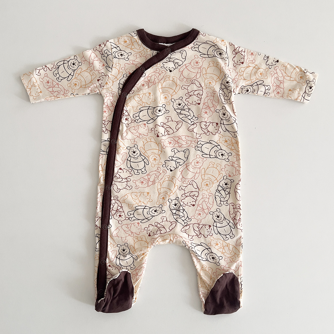 Beige and brown patterned sleepsuit