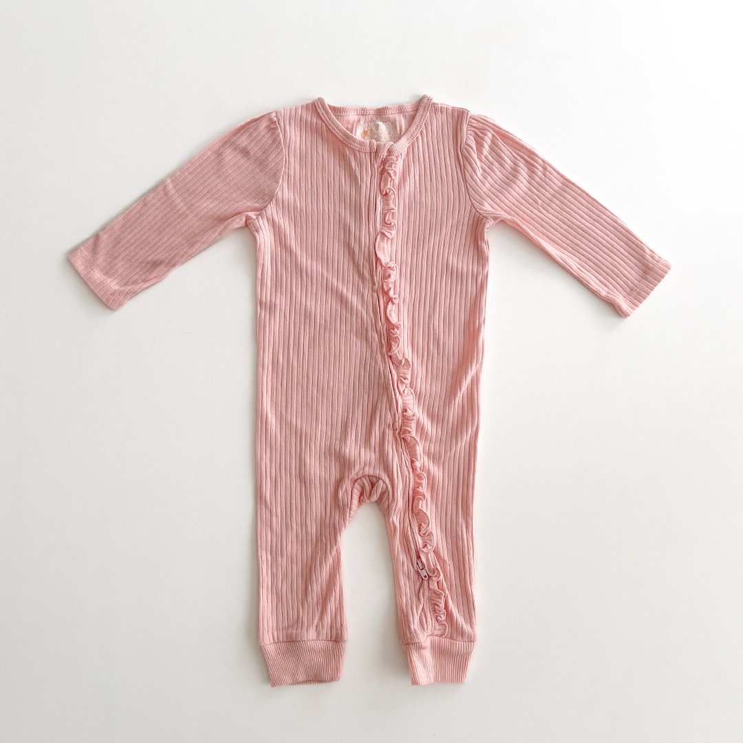 peach ribbed ruffles on front romper