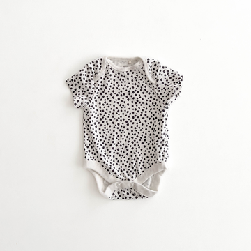 NEXT BABY BLACK AND WHITE PATTERNED ONESIE