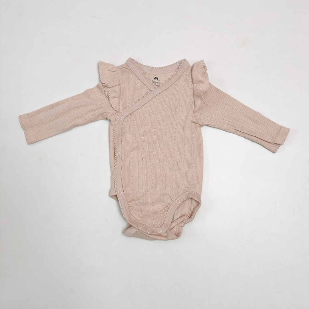 POINTELLE WRAPOVER RUFFLE ONESIE