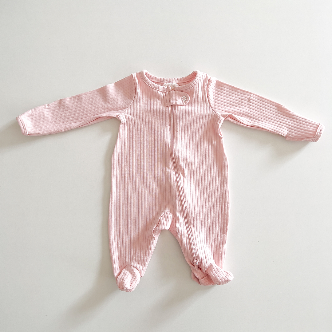 Pink ribbed sleepsuit
