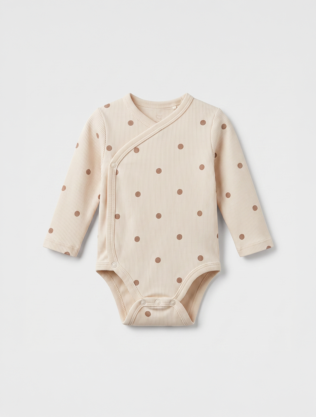 BEIGE POLKA DOTTED WRAPOVER ONESIE
