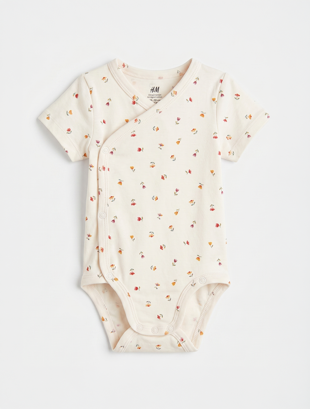OFF WHITE WRAPOVER FLORAL ONESIE