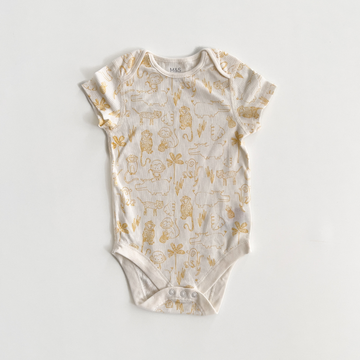 YELLOW ANIMAL PATTERNED ONESIE