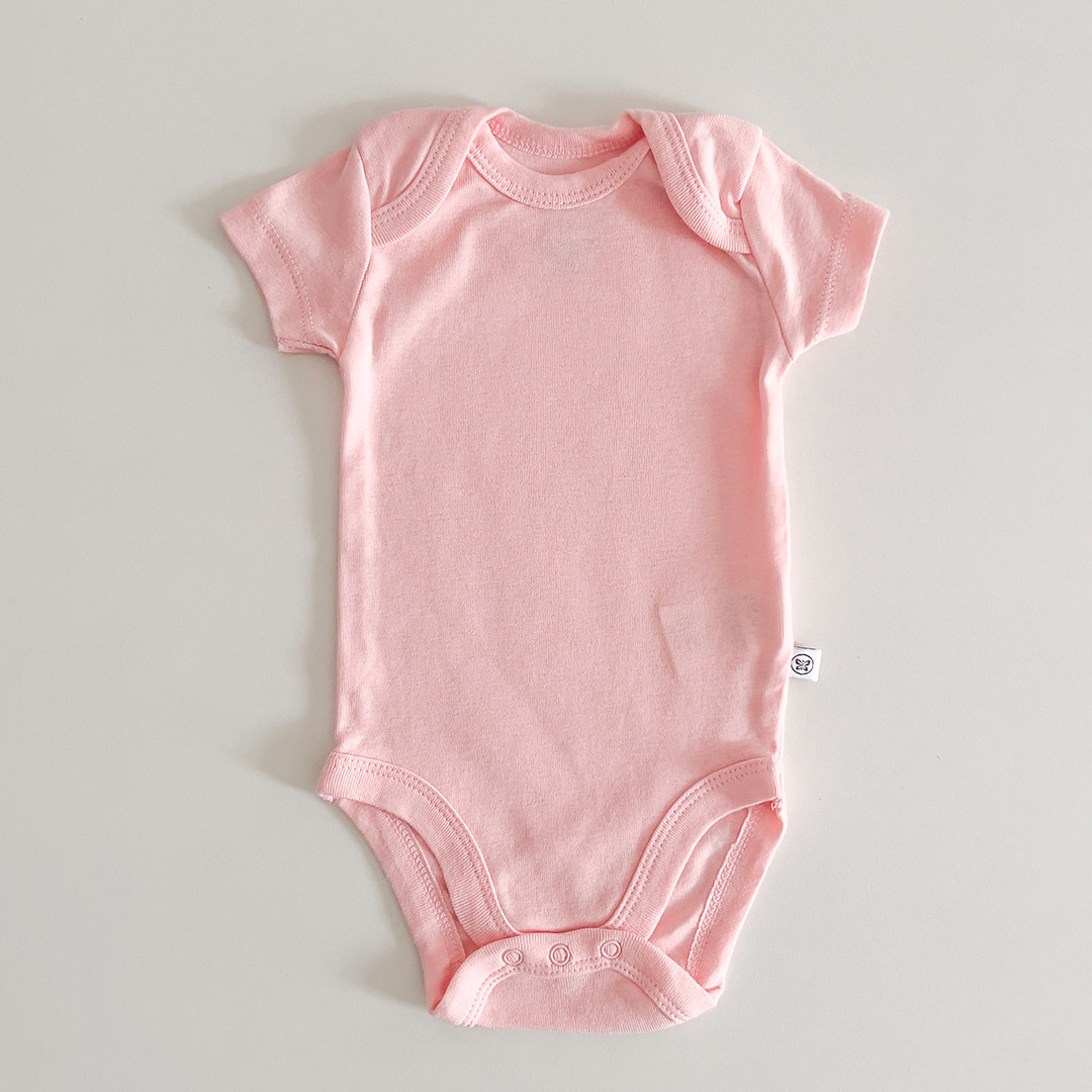 Pink coloured onesie