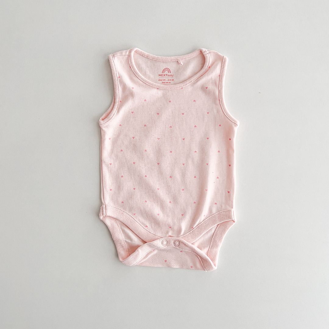 SLEEVLESS LOVE PRINT ONESIE