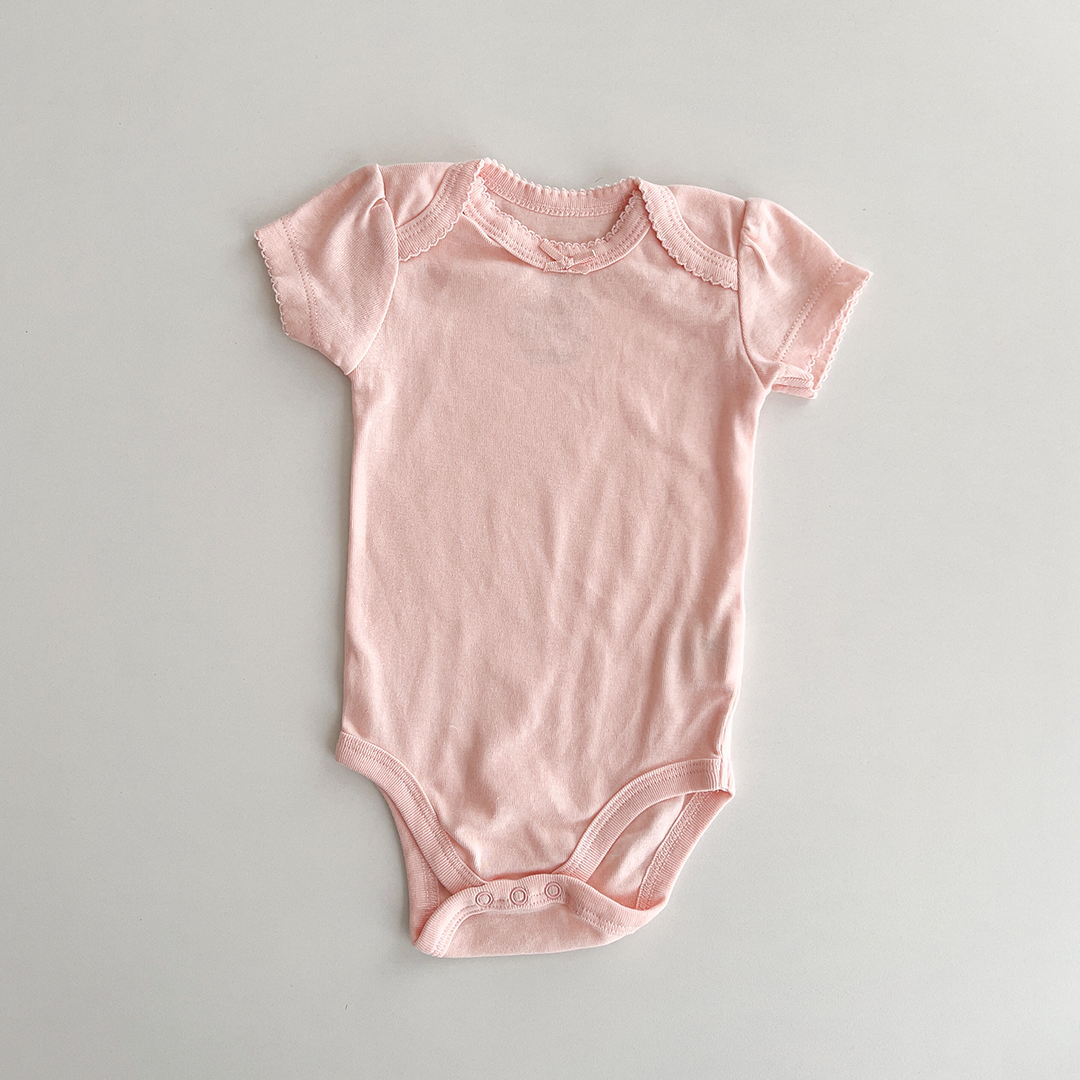Peach pink colour onesie