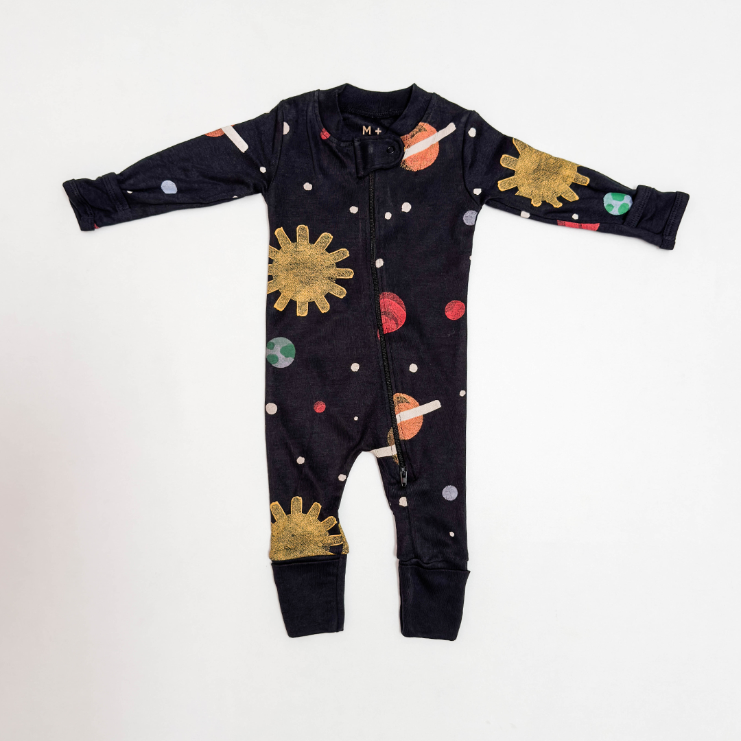 BLACK PATTERNED ZIPPER ROMPER