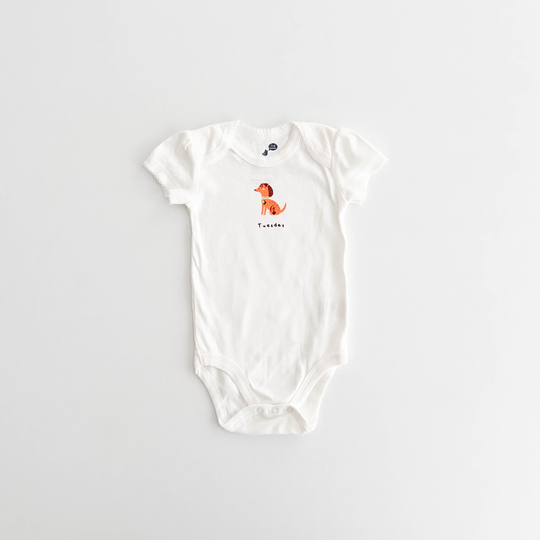 TUESDAY PRINTED ONESIE