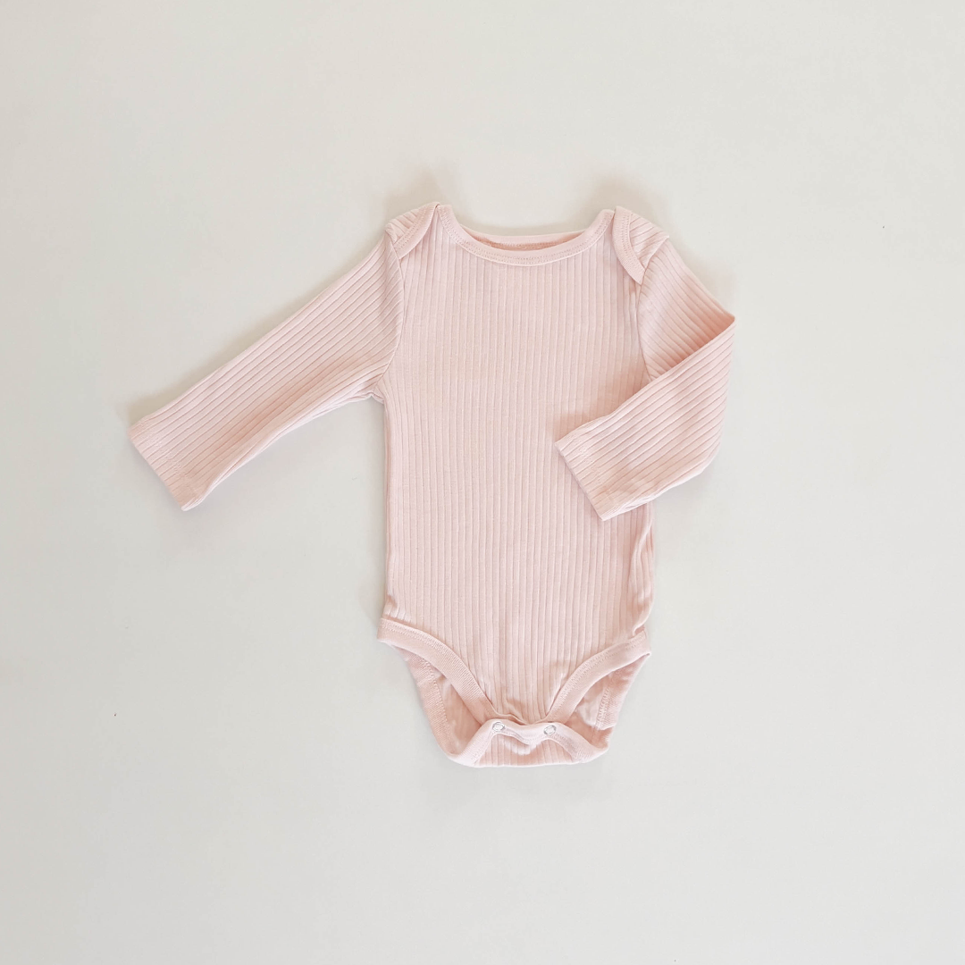 CREAMY PEACH RIBBED ONESIE
