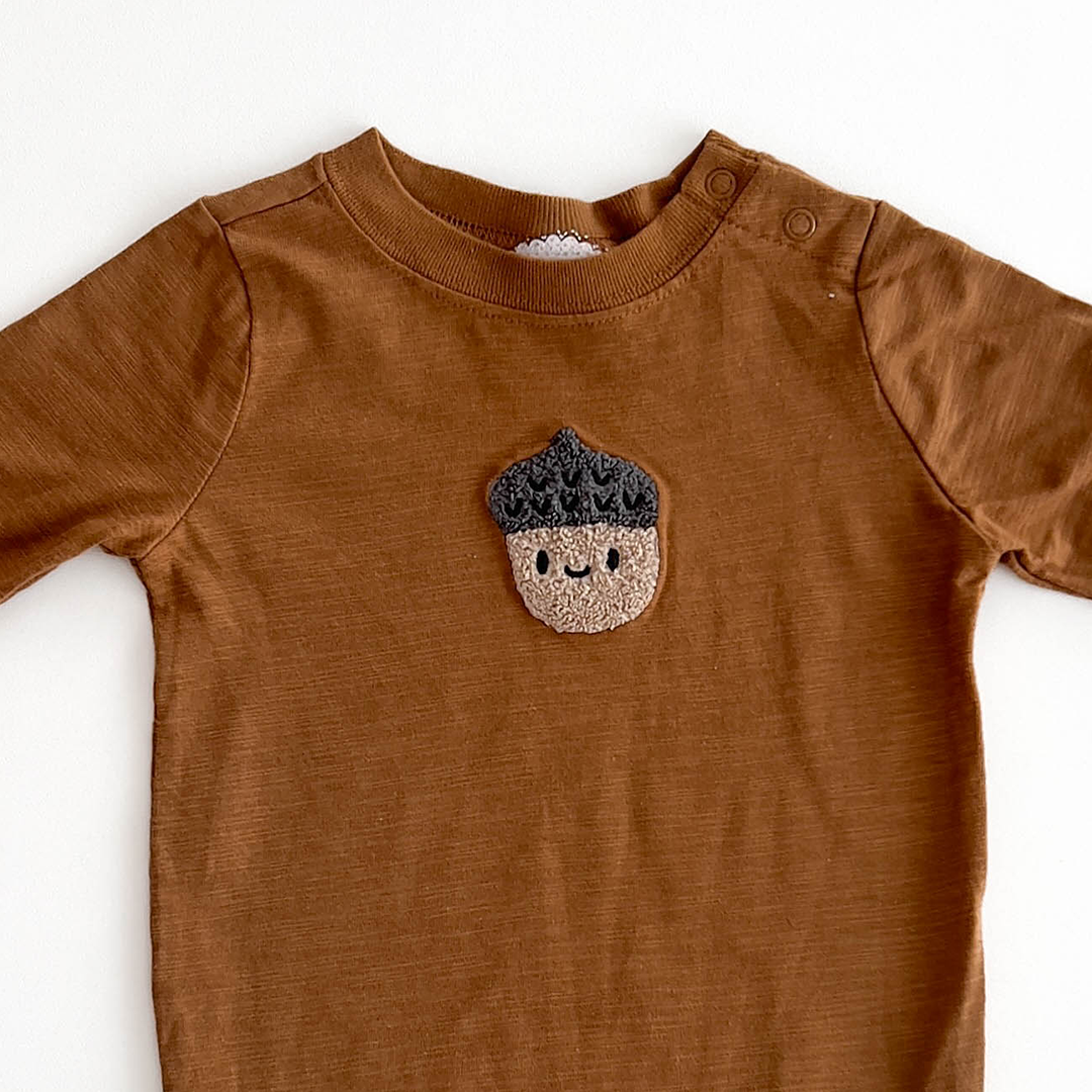BROWN PATTERNED ONESIE