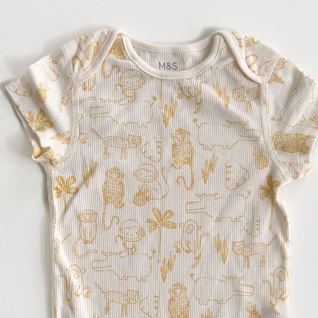 YELLOW ANIMAL PATTERNED ONESIE