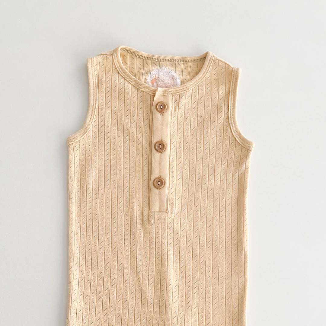 BUTTERMILK COLOURED POINTELLE ROMPER