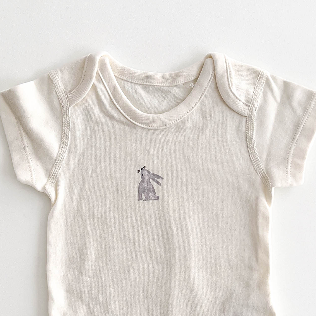 BUNNY PRINTED WHITE ONESIE