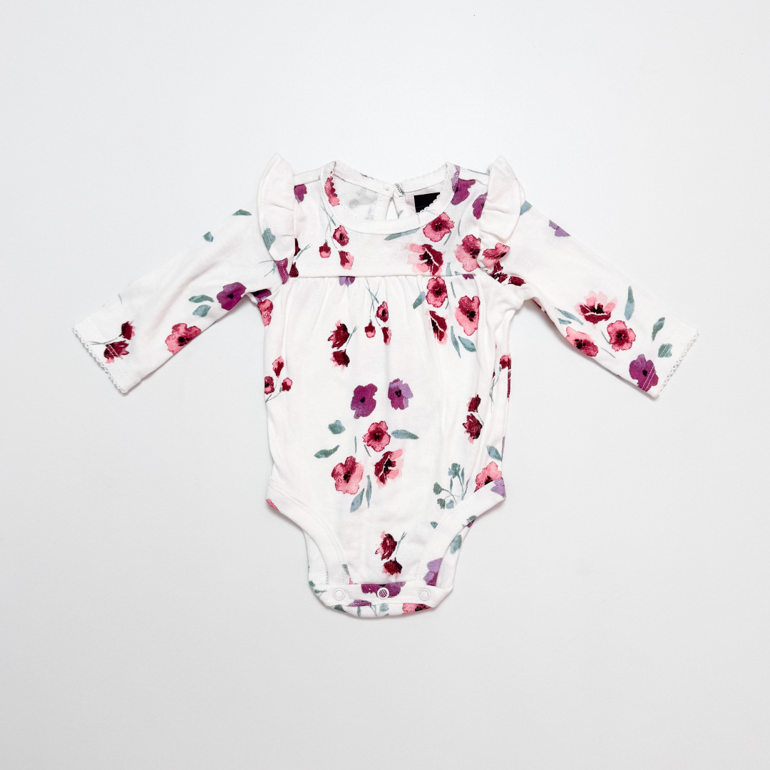 WHITE FLORAL RUFFLED ONESIE