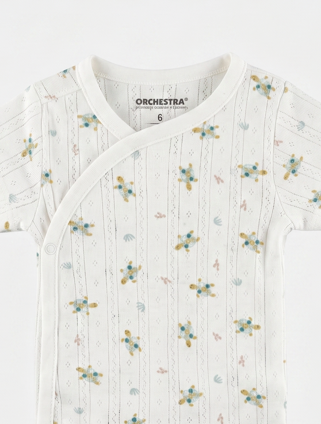 BEIGE POINTELLE WRAPOVER ONESIE