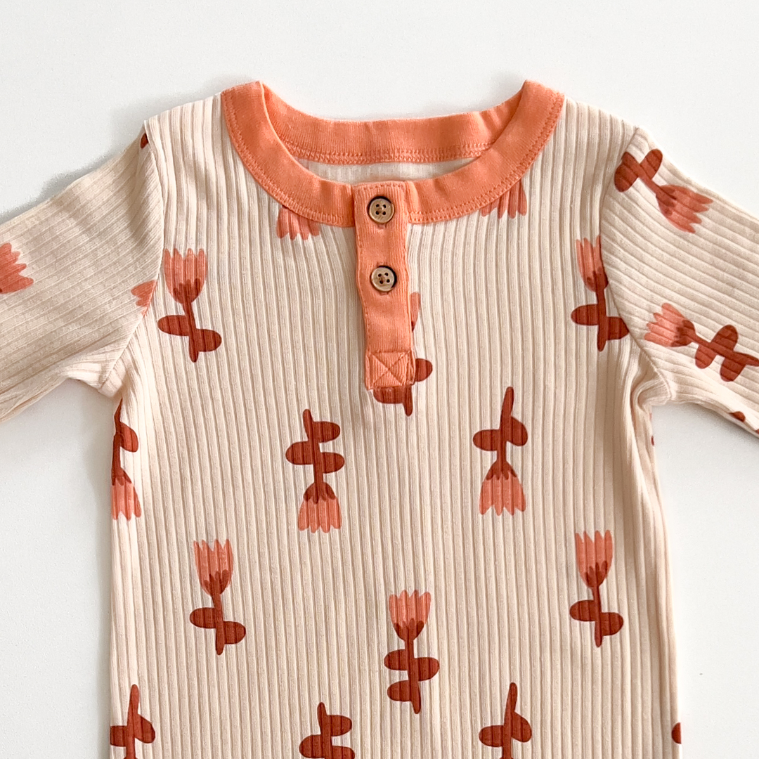 Unisex orange and beige romper