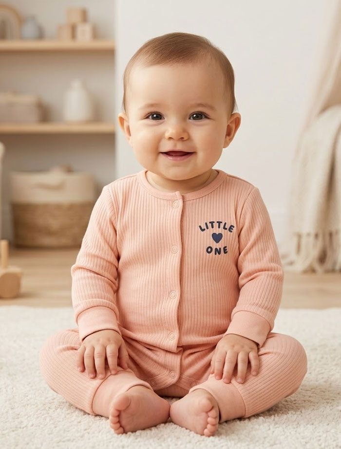 Peach ribbed button romper