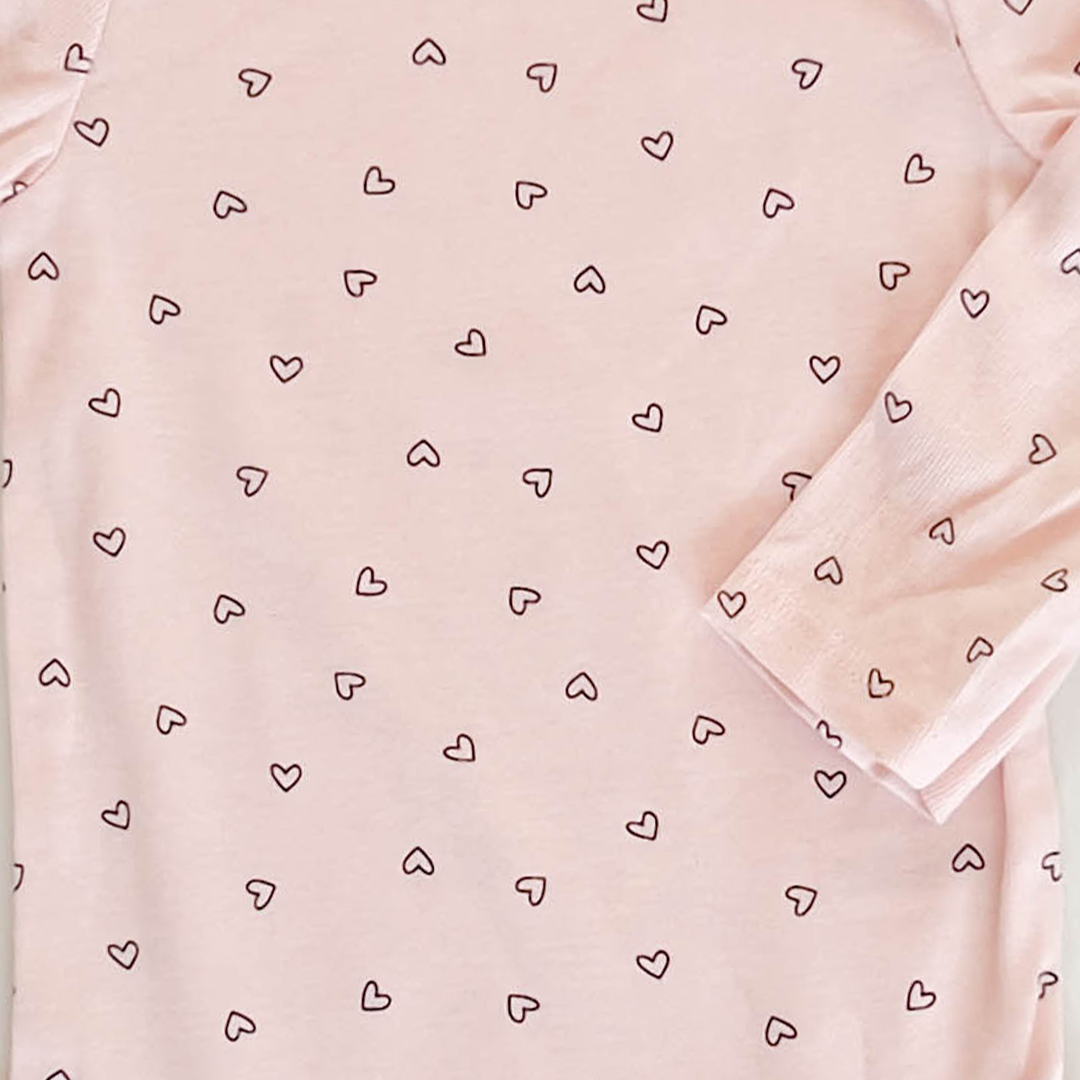 PEACH LOVE PATTERNED ONESIE