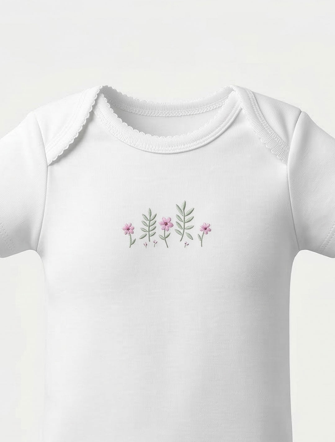 WHITE FLORAL ONESIE