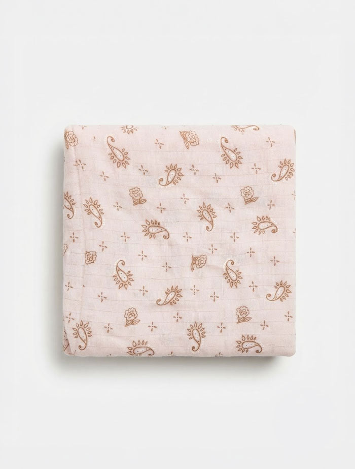 Pink printed organic cotton muslin swaddle