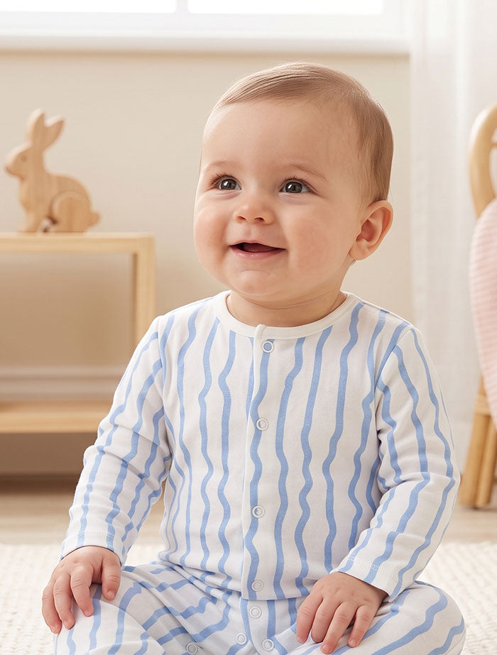 Blue and white patterned button sleepsuit