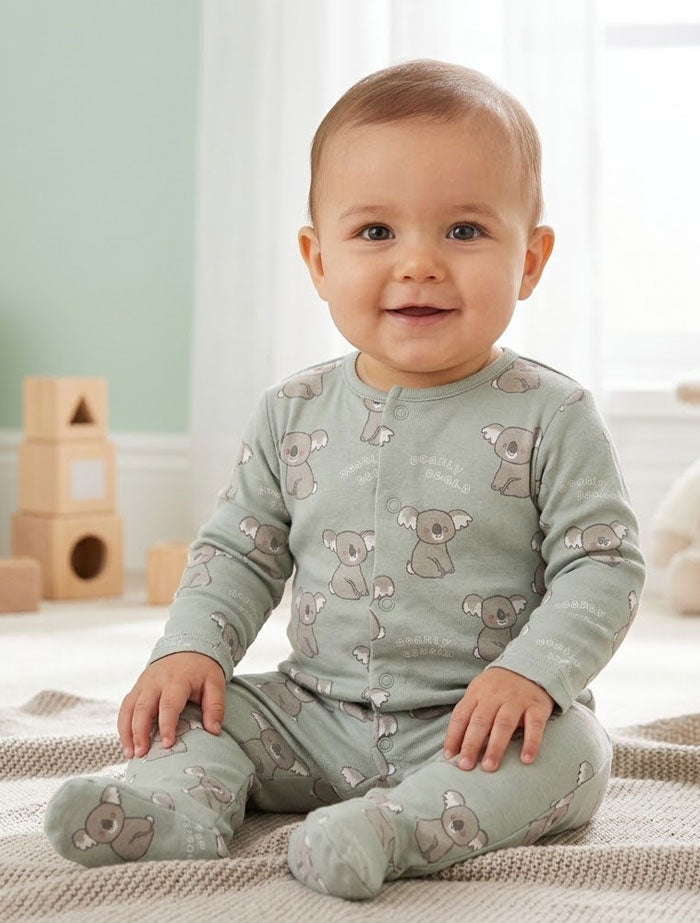 Pastel green printed button sleepsuit