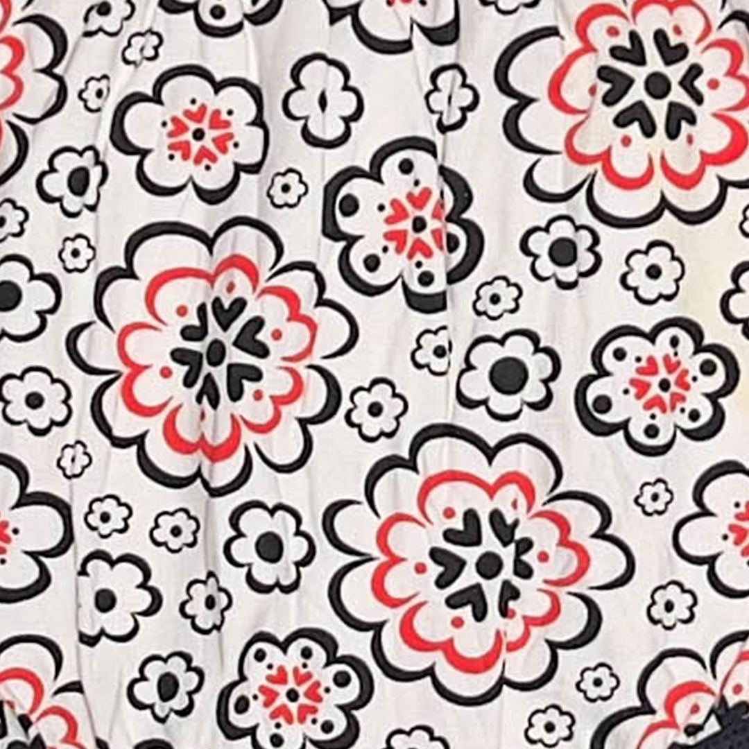 BLACK AND WHITE FLORAL ONESIE