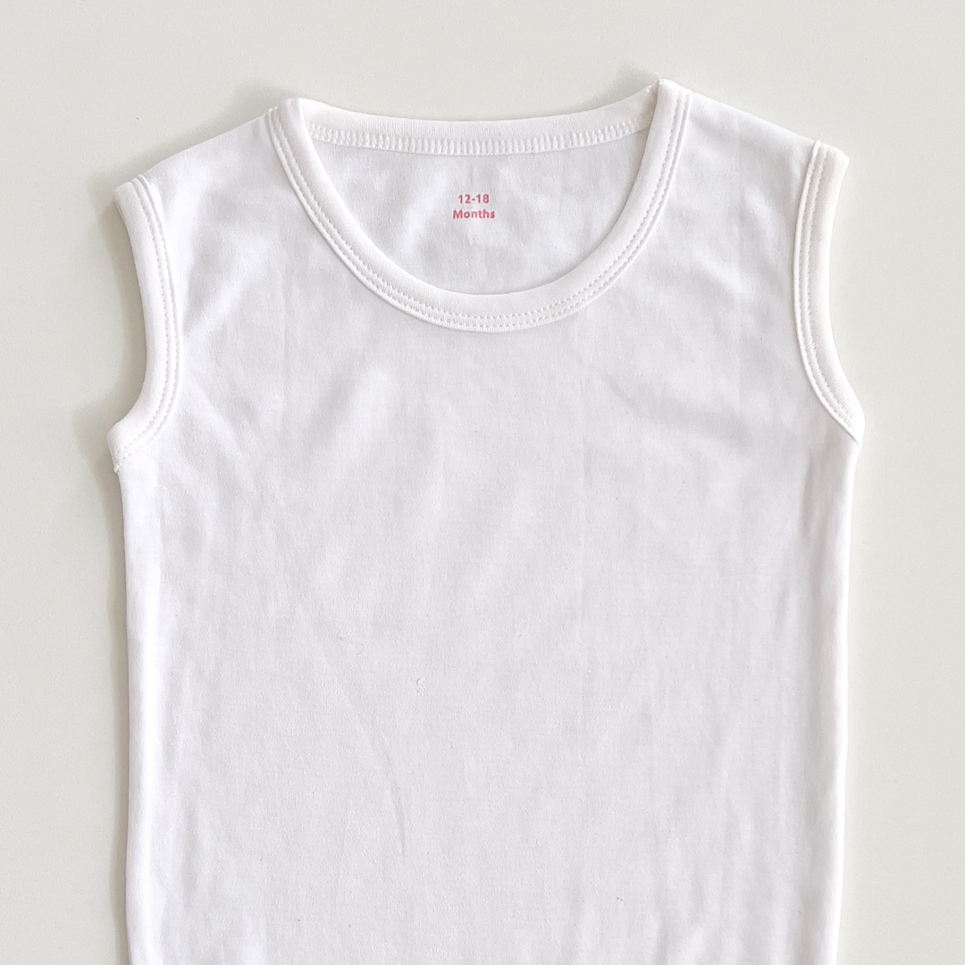 WHITE SLEEVLESS ONESIE