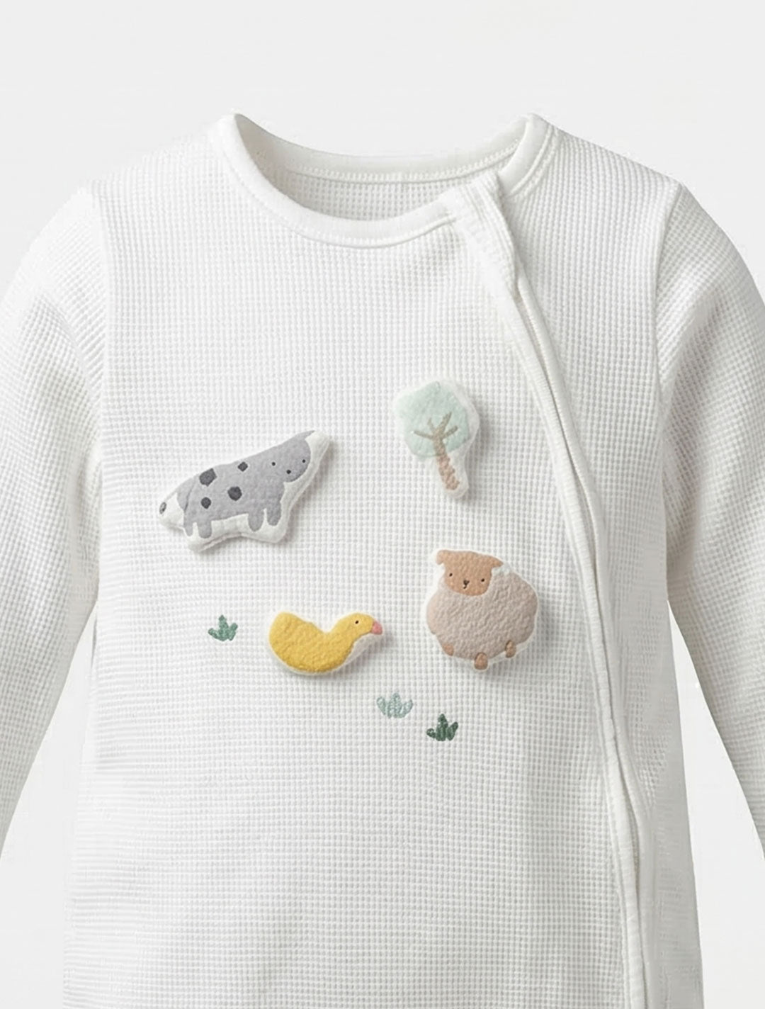 WHITE KNITTED ZIPPER SLEEPSUIT
