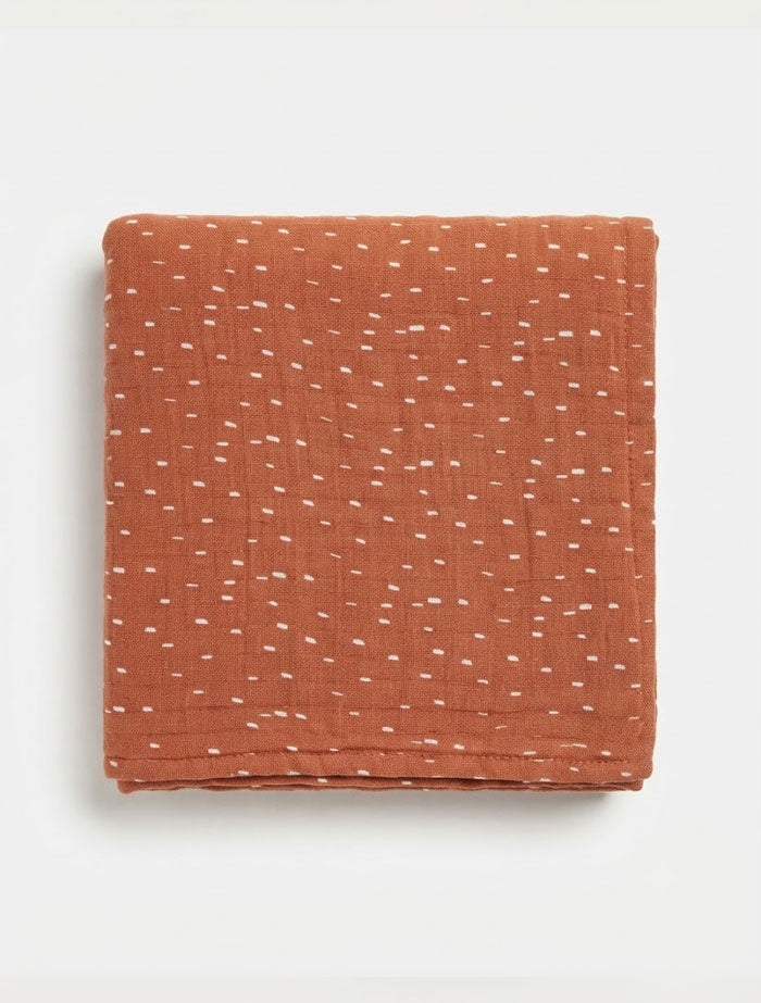 Brown patterned organic cotton muslin swaddle