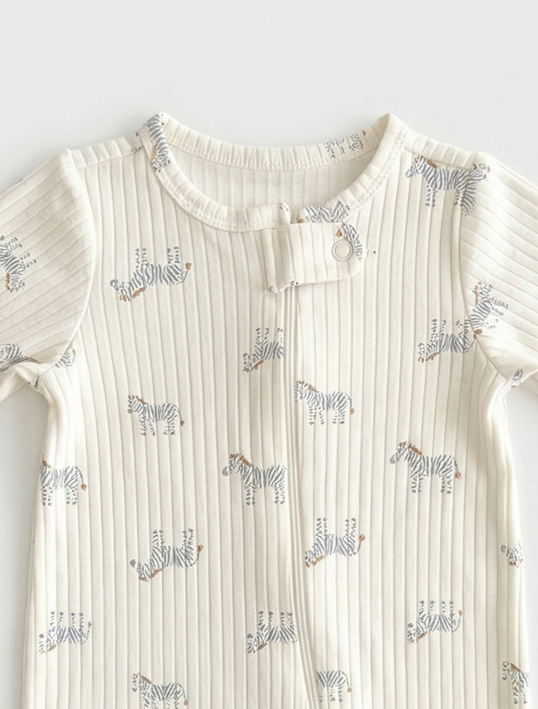 ZEBRA PATTERNED RIBBED WHITE SLEEPSUIT