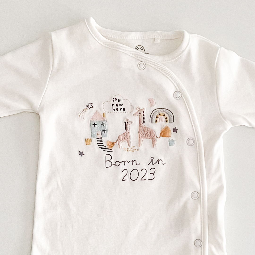 White born in 2023 sleepsuit