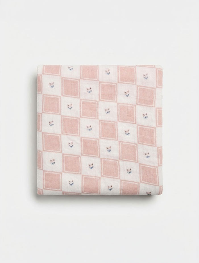 Dusty pink check muslin swaddle