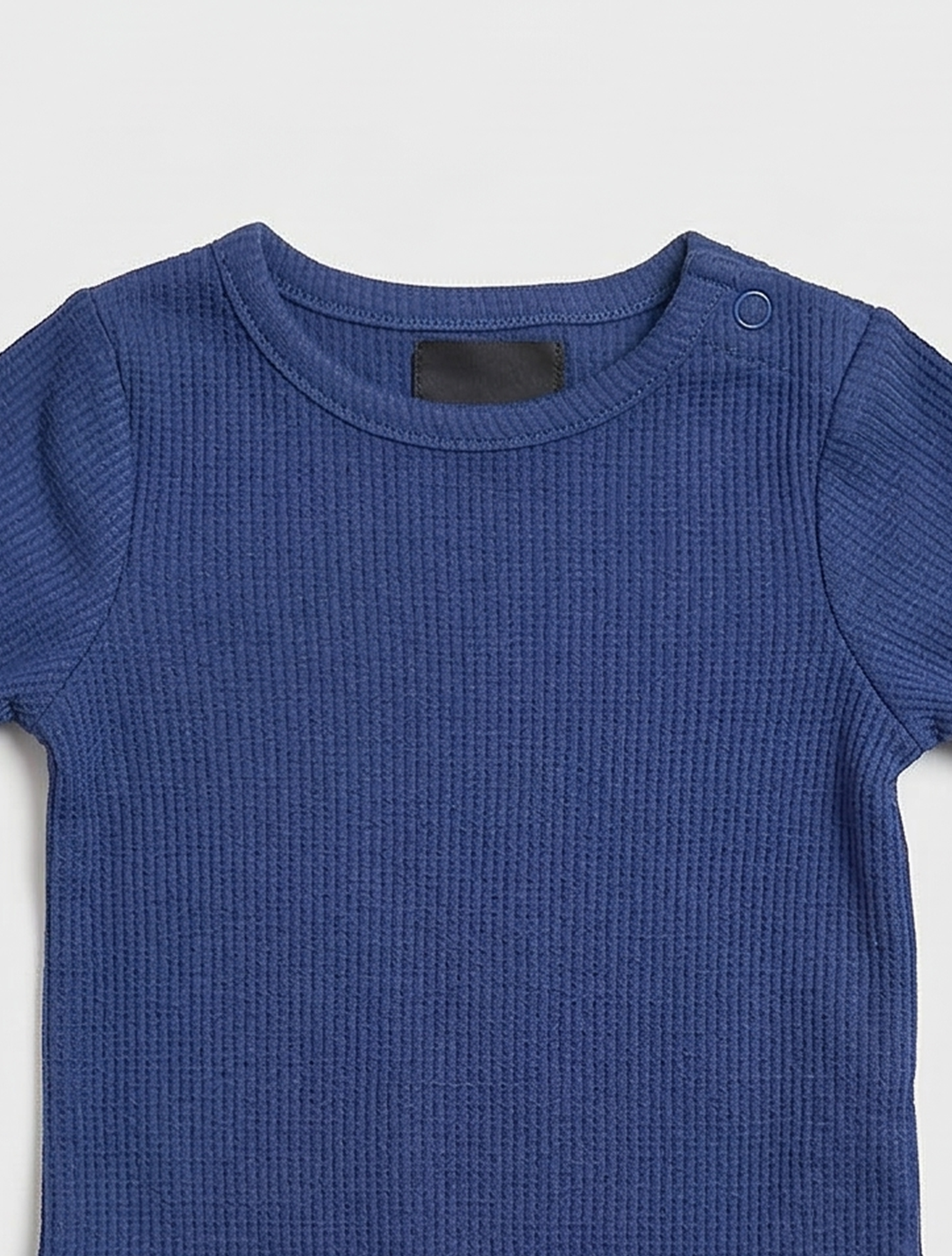 BLUE KNITTTED ONESIE