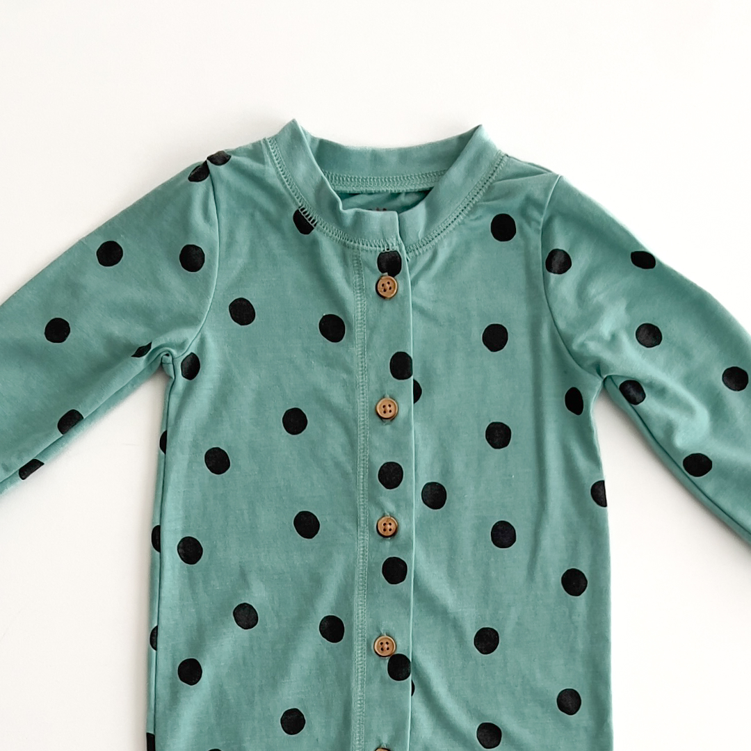 aqua green black polka dotted romper