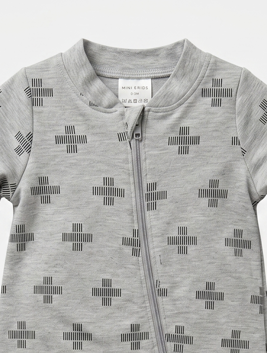 Grey pattered sleepsuit