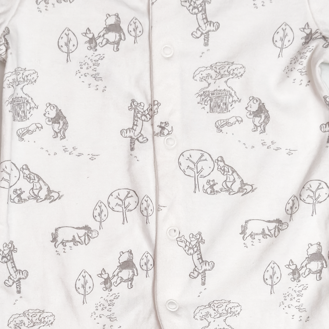 WHITE PRINTED BUTTON SLEEPSUIT