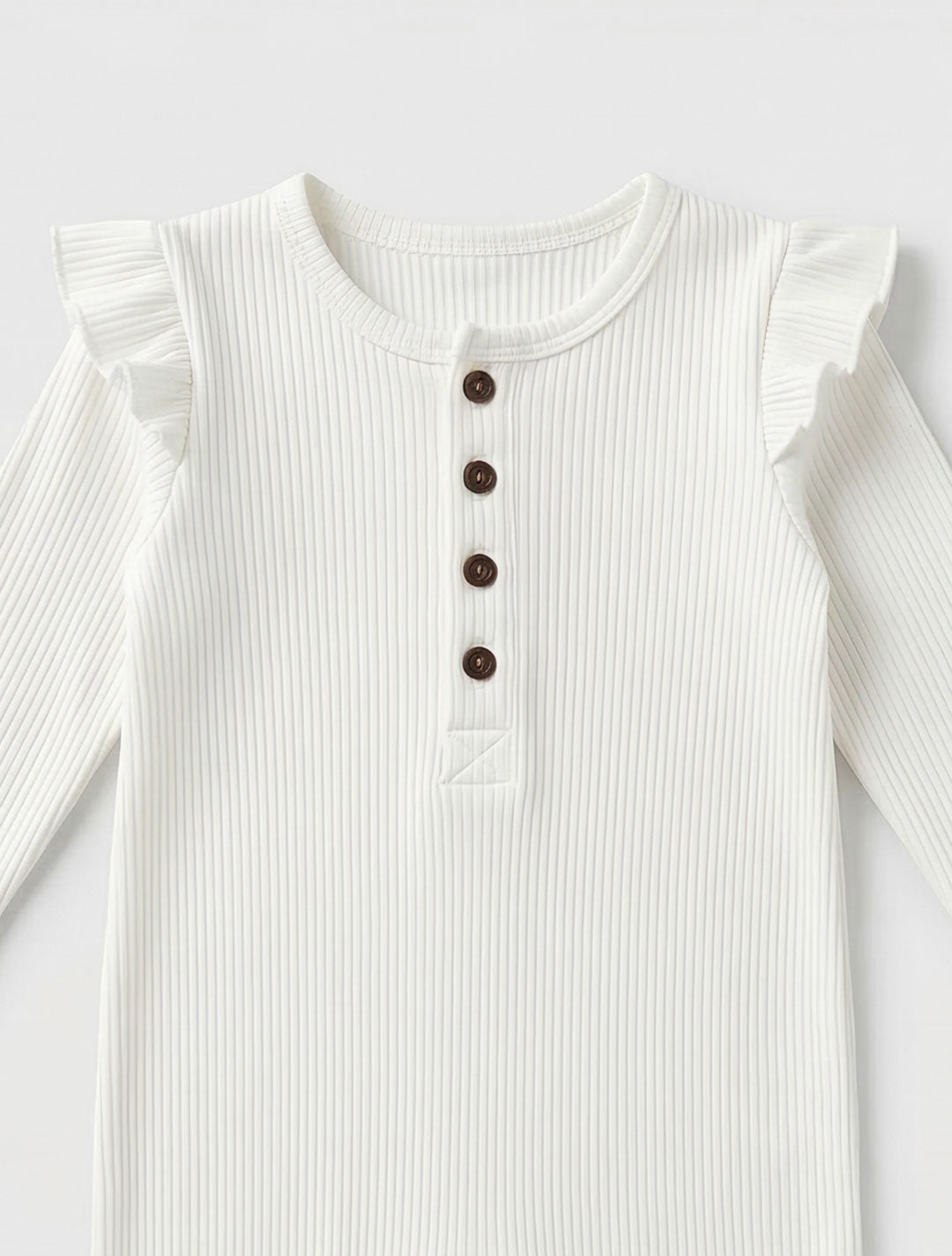 WHITE RUFFLED RIBBED ROMPER
